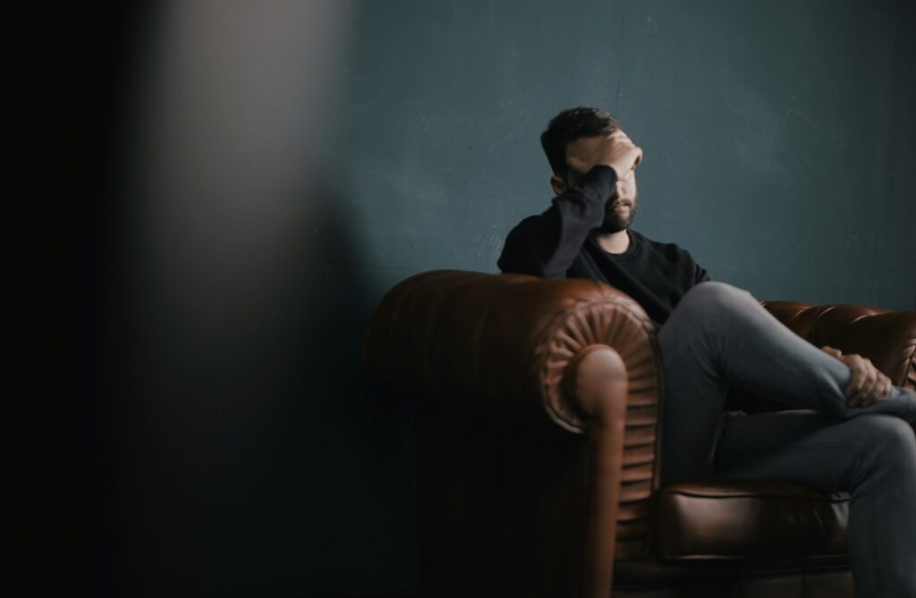 Teenage girl expressing emotions with support from a counselor