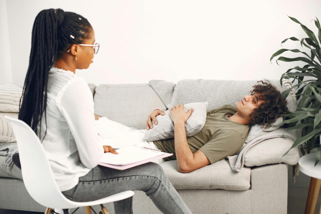 Therapist conducting a functional behavior assessment with a child